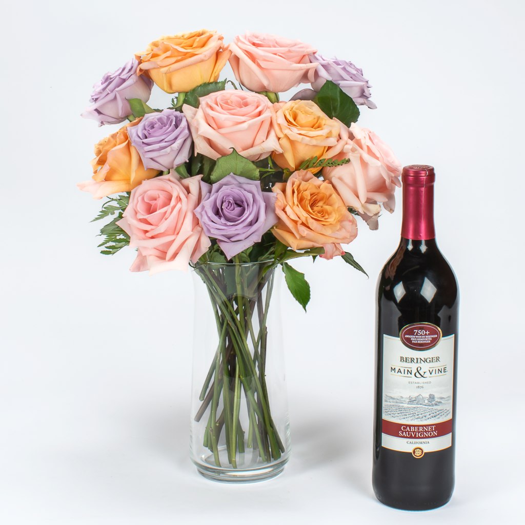 Cabernet Wine And Mixed Roses In Vase