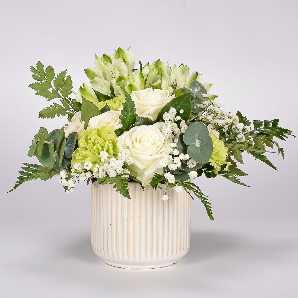 White Flowers And Greenery In Vase For Delivery 