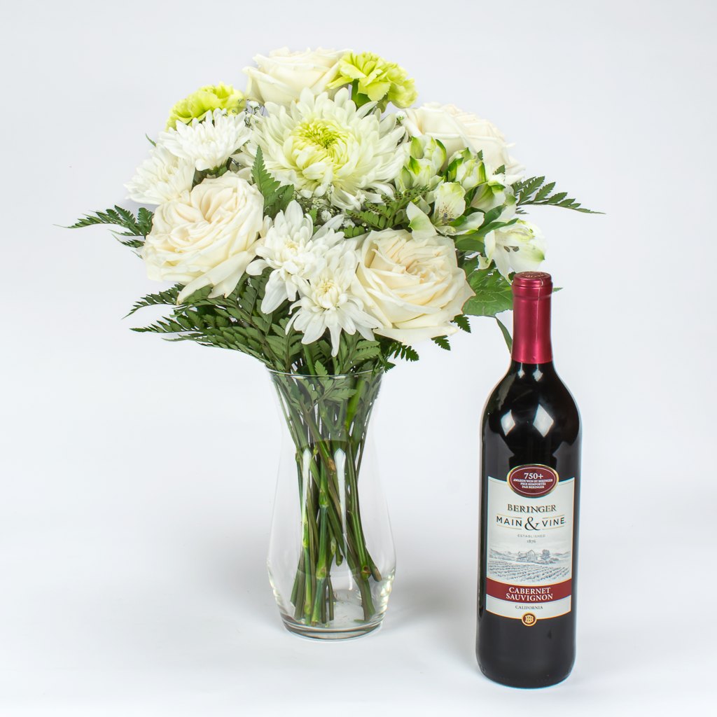 Premium White Flowers In Vase With Cabernet Wine